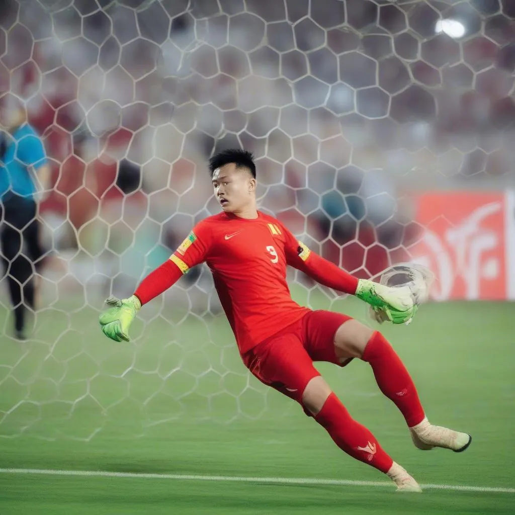 Thủ môn Đặng Văn Lâm cản phá penalty trong trận chung kết AFF Cup 2018