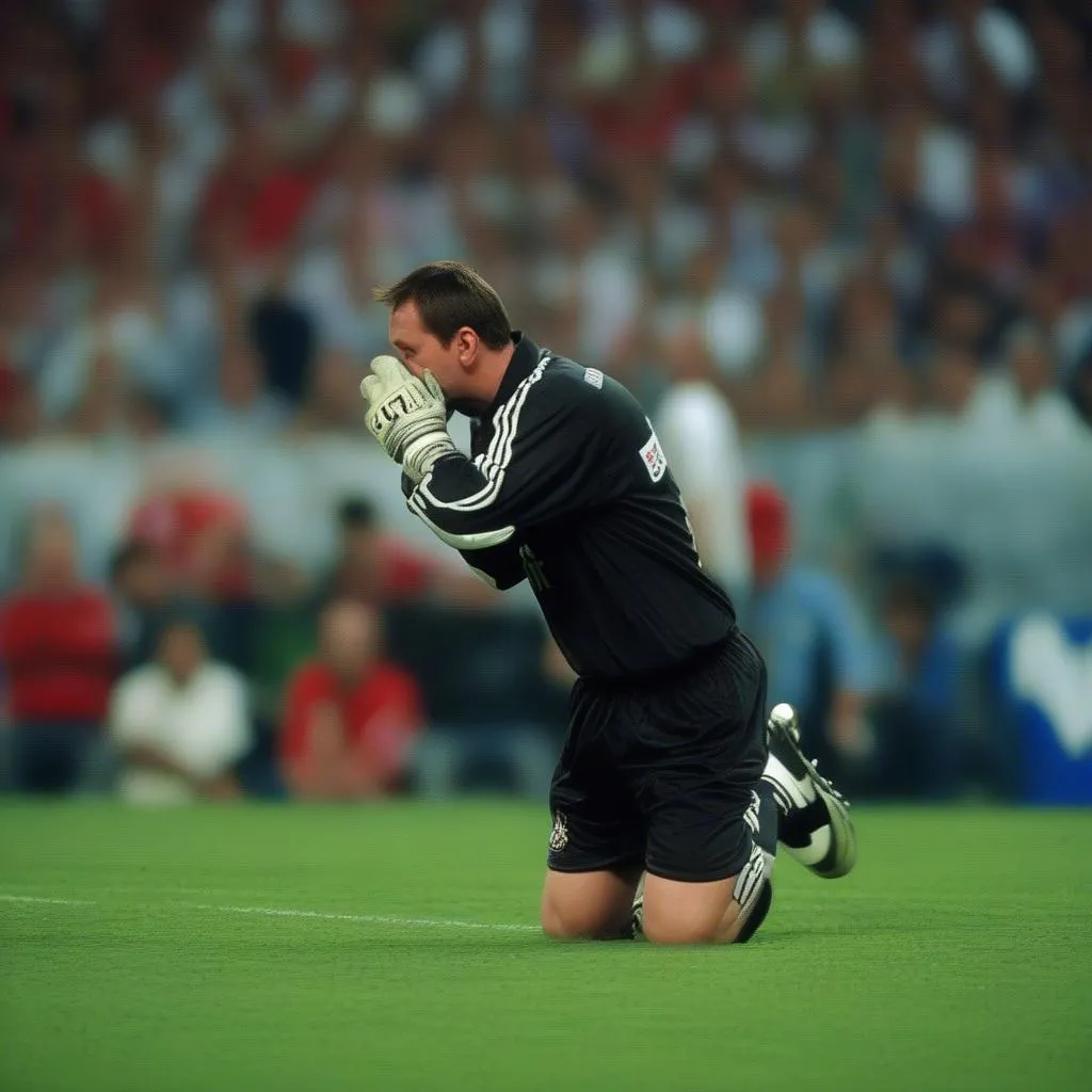 Jerzy Dudek cản phá thành công cú sút luân lưu của AC Milan